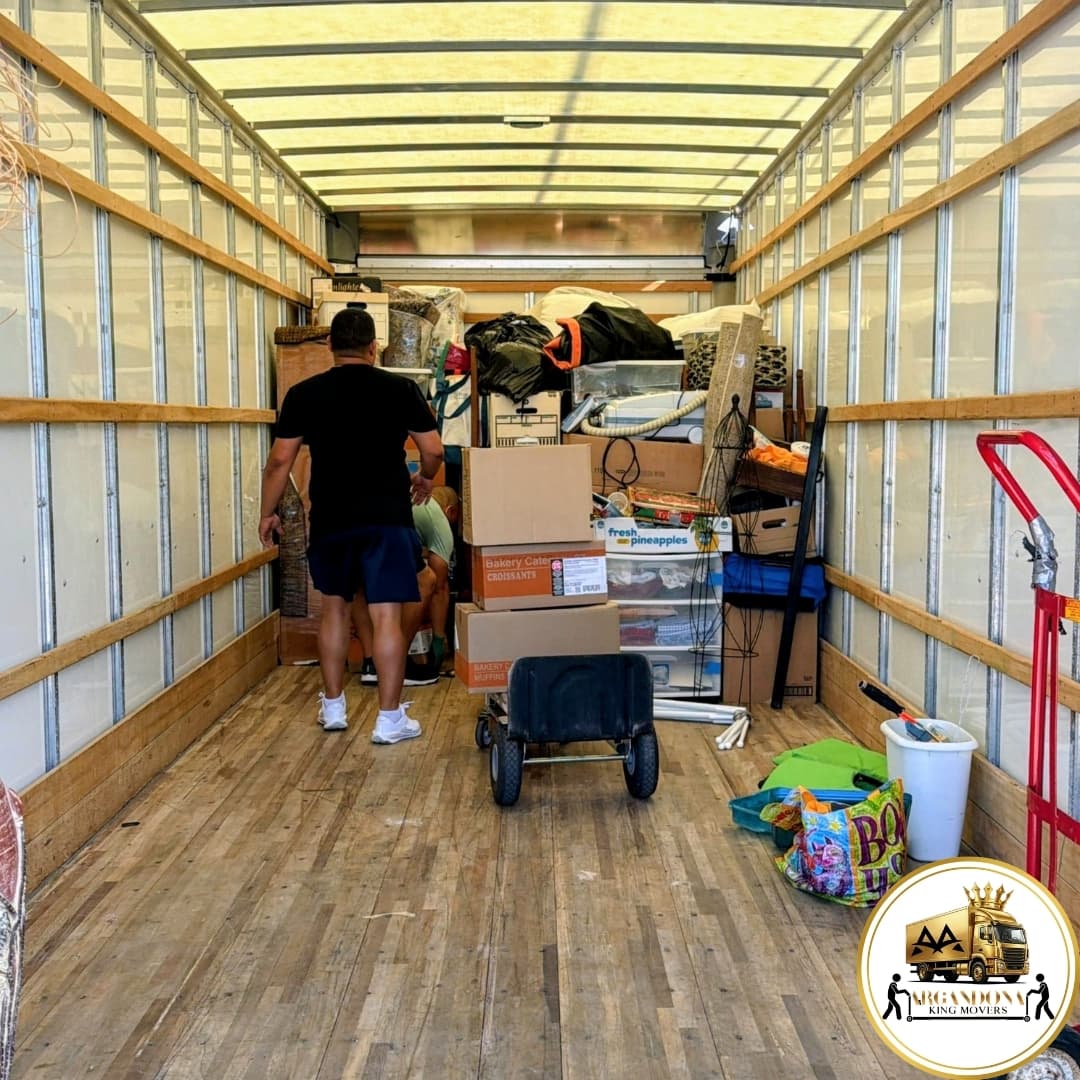 ARGANDONA KING MOVERS crew loading a professional moving truck in Tampa